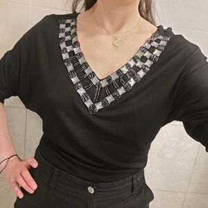 Elegant Black V-Neck Blouse with Checkered Accent